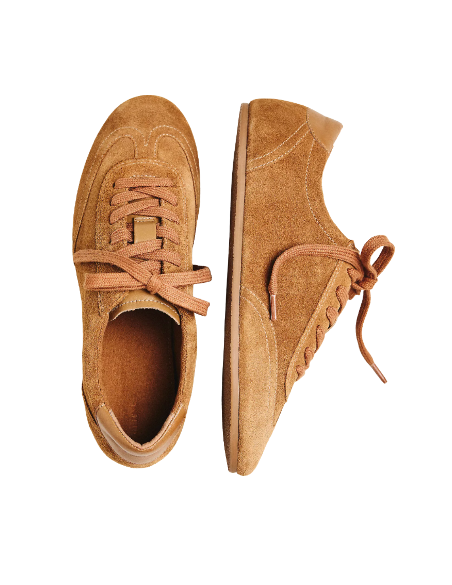 A pair of tan suede sneakers with laces on a white background.