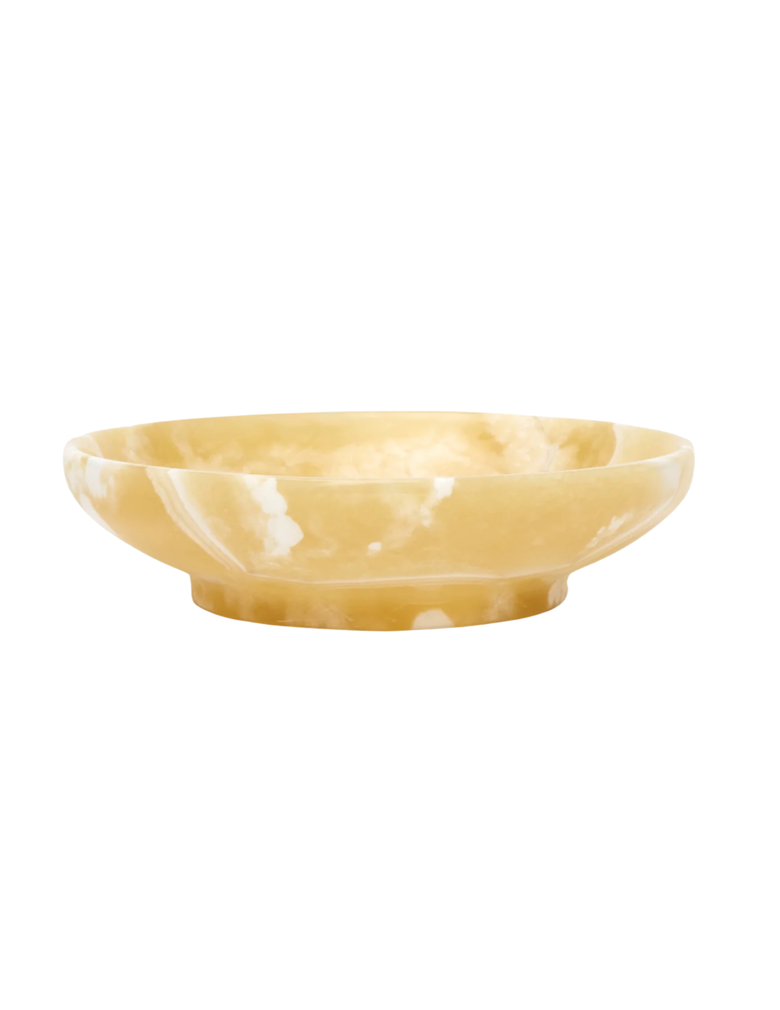 Yellow marble bowl with white veins on a white background