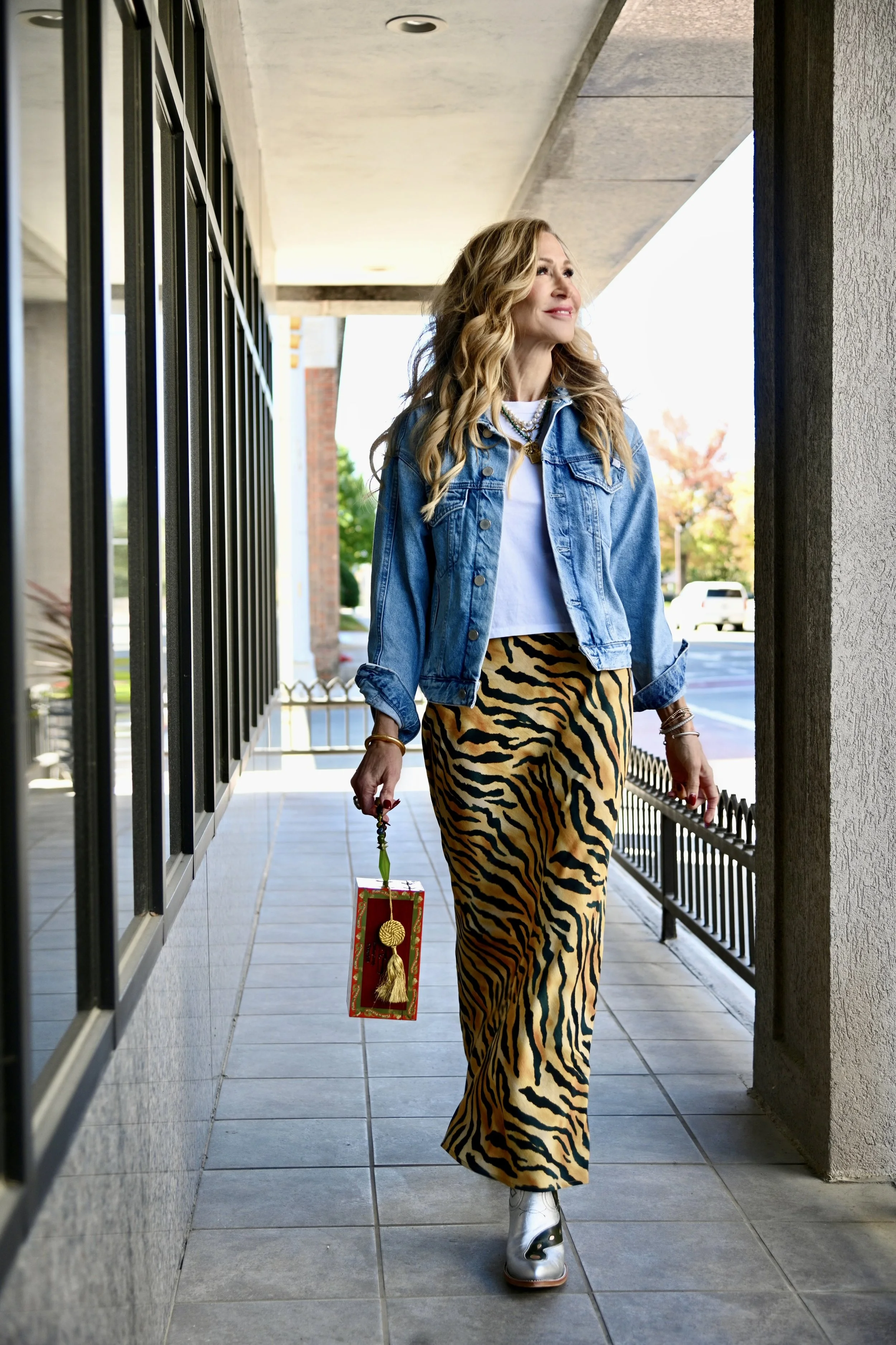    Denim Jacket   ,    White Crewneck Tee   ,    Silver Cowboy Boots   