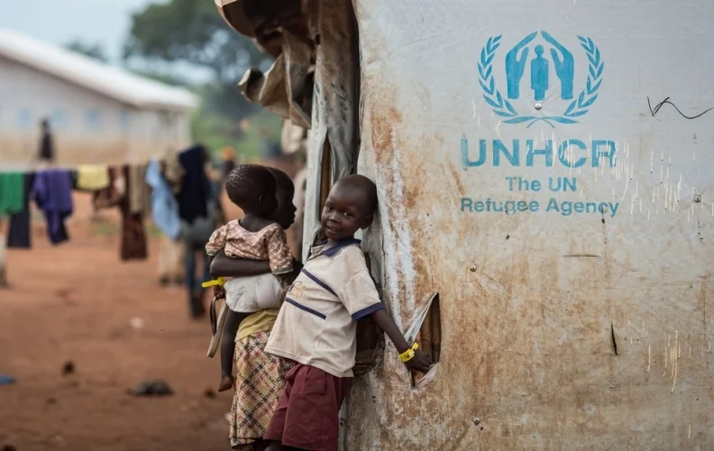 UNHCR/Will Swanson. A refugee boy from South-Sudan is photographed at the Numanzi Transit Center, where UNHCR provides temporary shelter and food in Adjumani in northern Uganda.