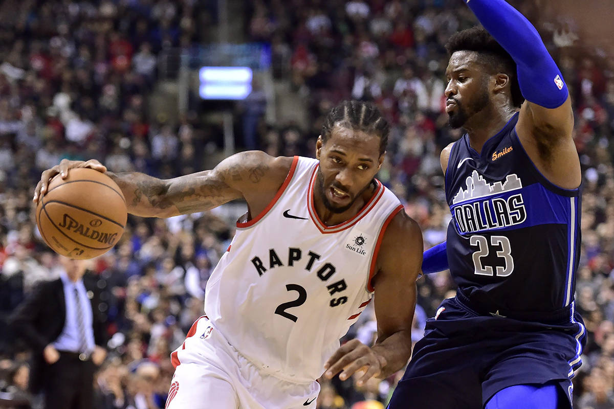 14151551_web1_181026-IFD-Raptors-Mavs2.jpg
