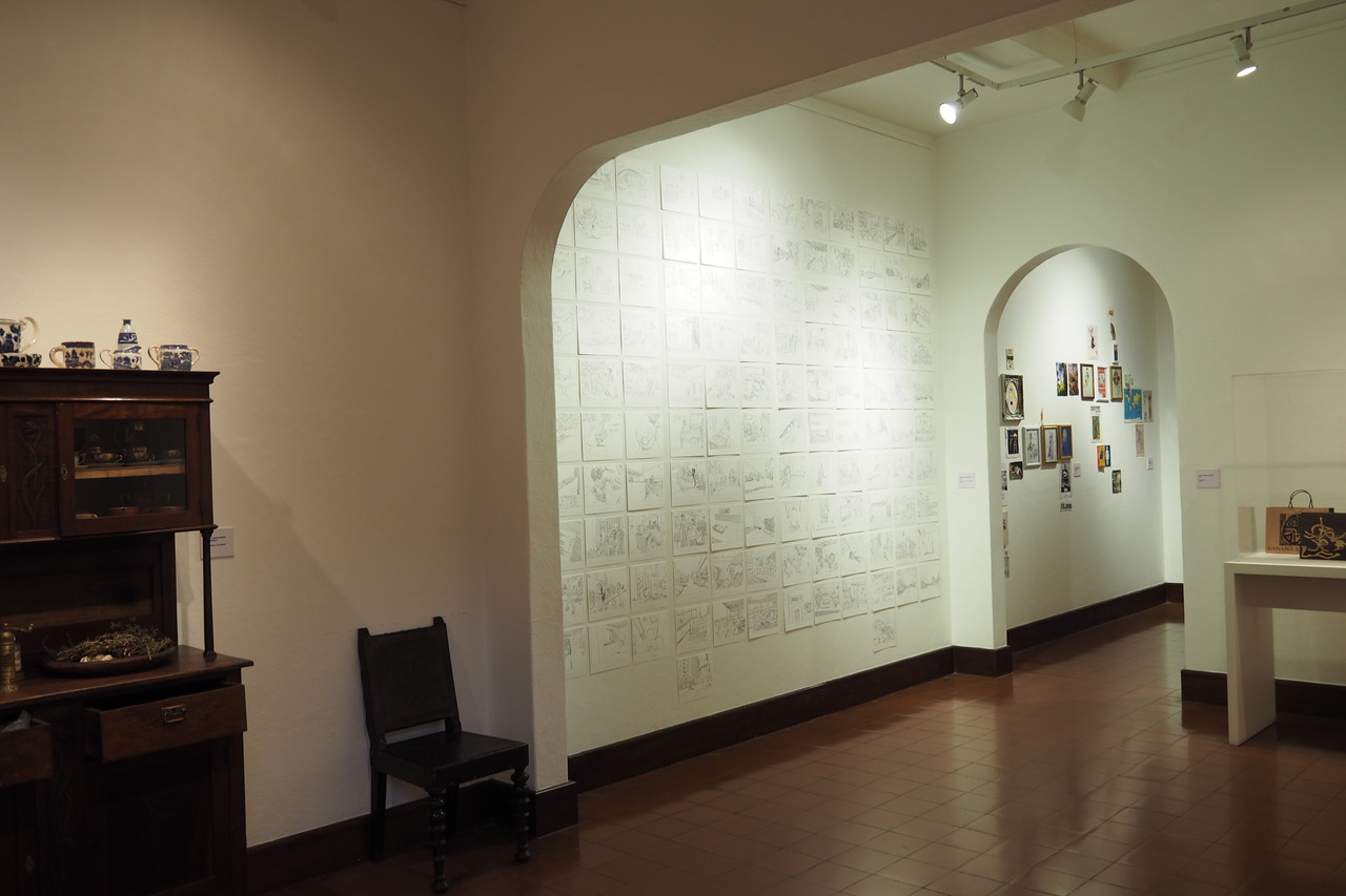 salón nacional 2017. izquierda: “Autorretrato 1”, roberto lizano duarte. centro: “11:11”, luciano goizueta. fondo: “Control de plagas= Mito moderno: Una mancha a-temática” y “¿Arte indígena? ¡Que prosiga la empresa del tropicalismo multinacional!”, pablo romero valverde.