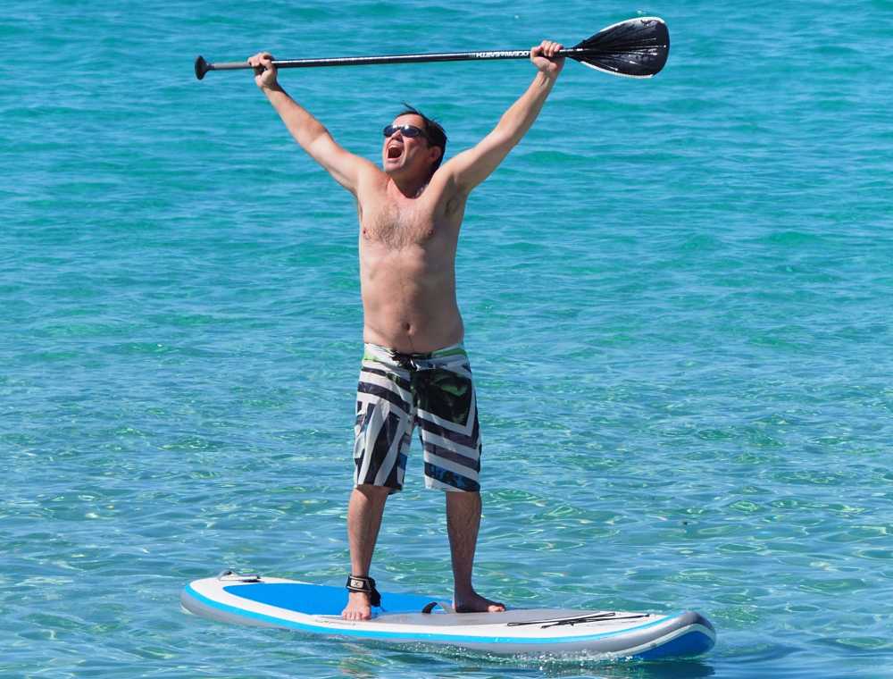 Stand up paddle or surrendar pose