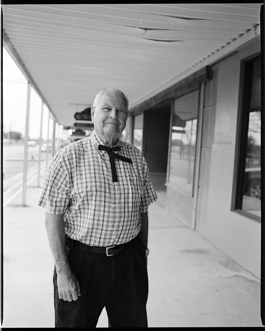 Man in western tie - Luling, TX, 2019 / Kodak TriX400 / 65mm lens at f5.6