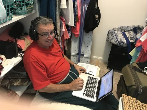Chuck in the closet recording an interview