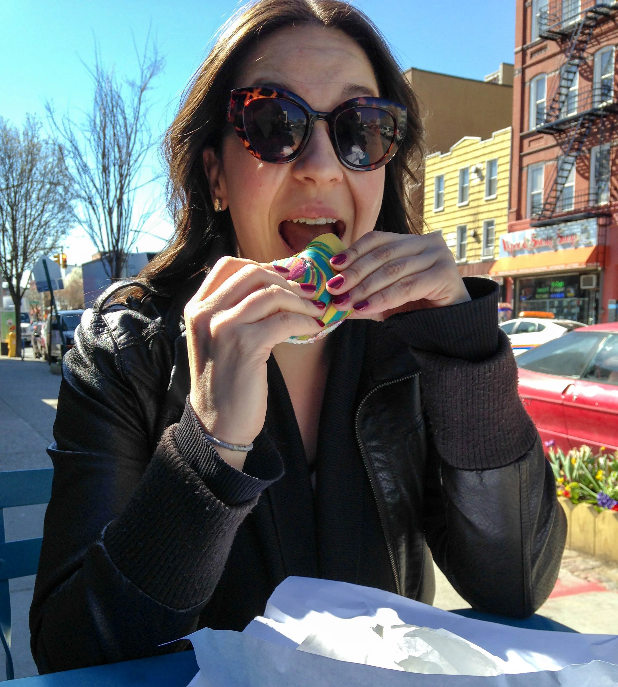 Eating a Rainbow Bagel with Cannoli Cream Cheese in Brooklyn, because why not?