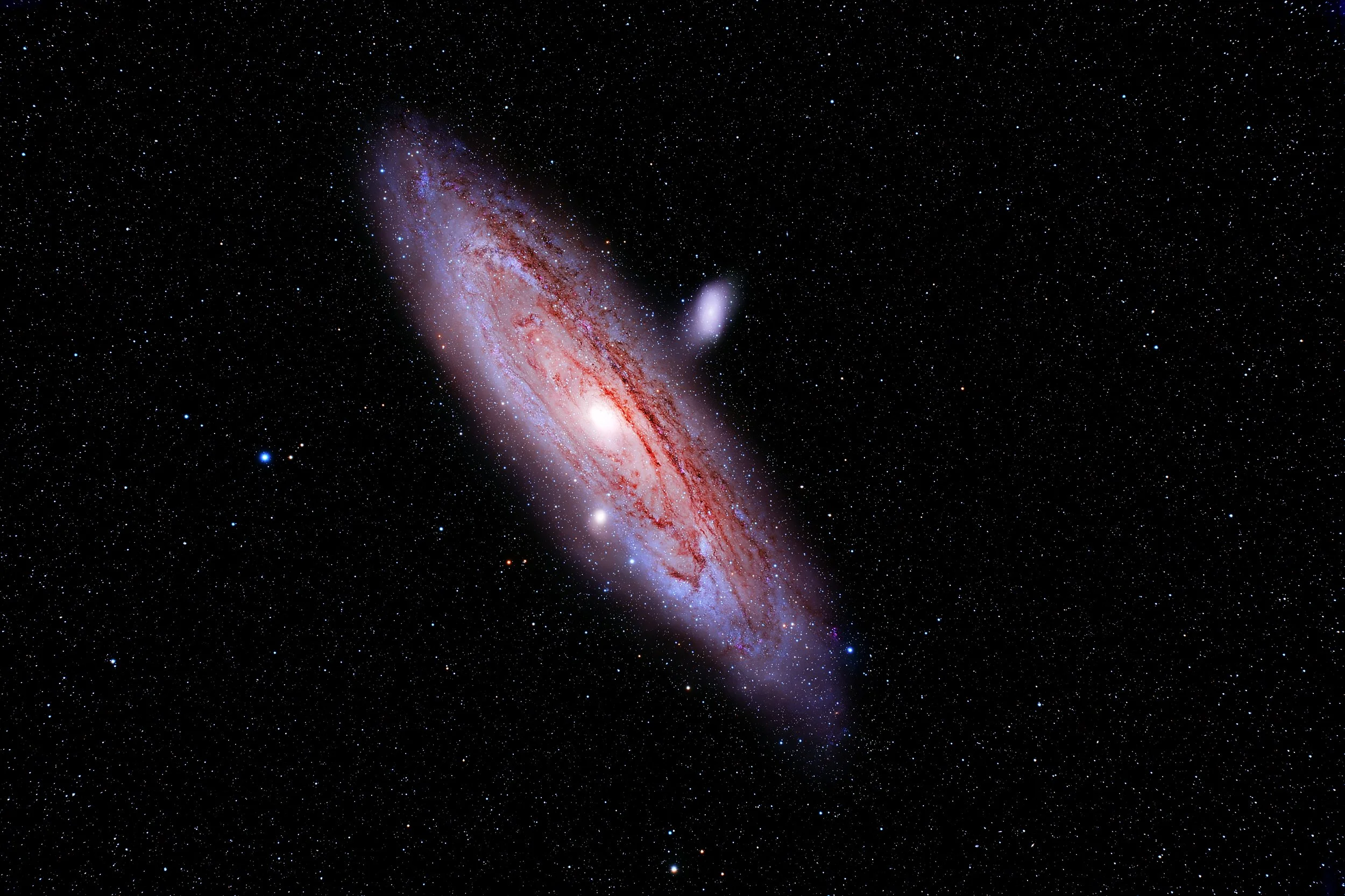 M31 is the nearest large spiral galaxy to the Milky Way, lying about 2.5 million light-years away in the constellation Andromeda. It’s the largest member of the Local Group and spans several degrees across the sky, revealing a massive disk threaded w