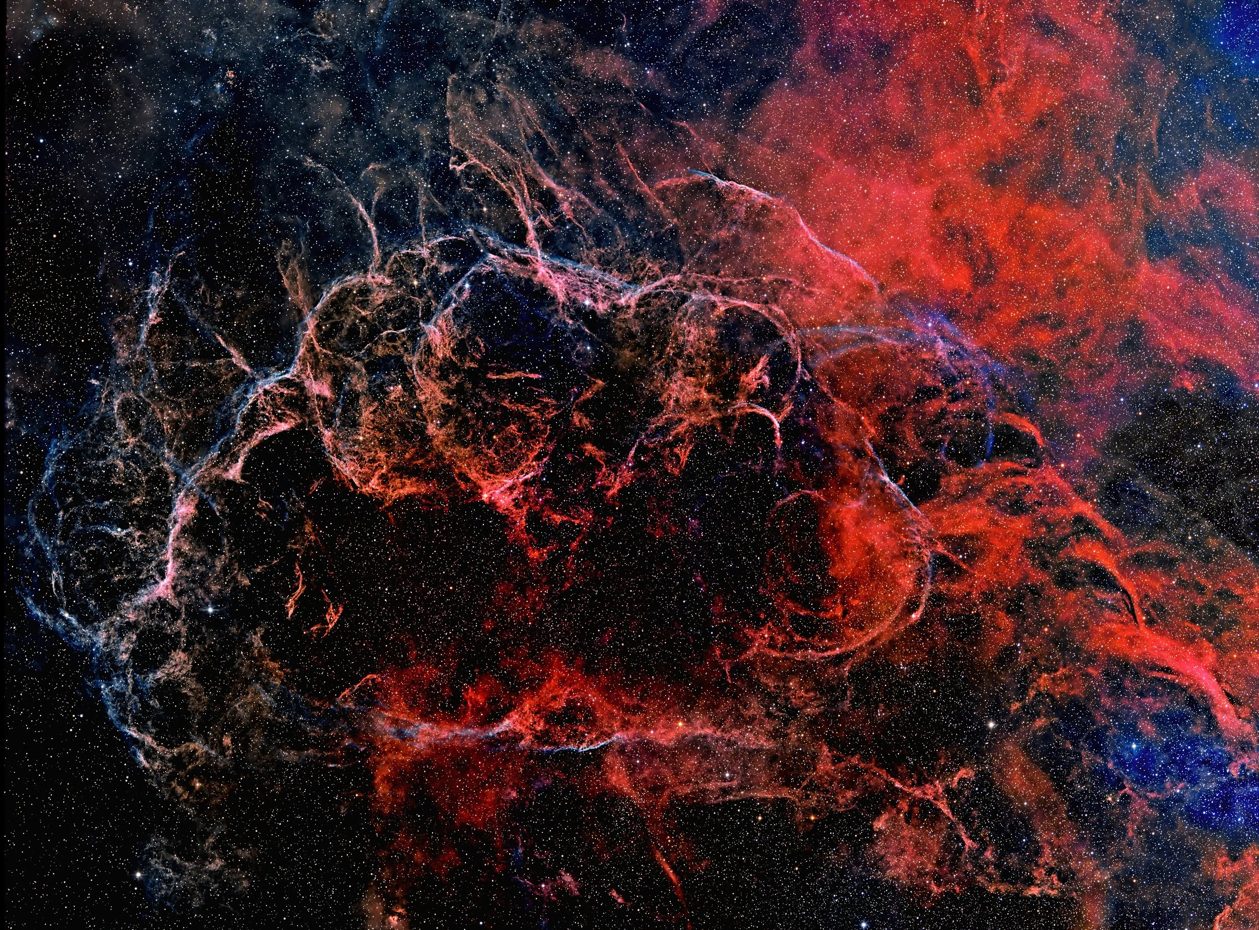 The Vela Supernova Remnant is one of the closest and largest supernova remnants known, lying only about 800–1,000 light-years away. It is the expanding debris of a massive star that exploded roughly 11,000 years ago, now spread across an enormous reg
