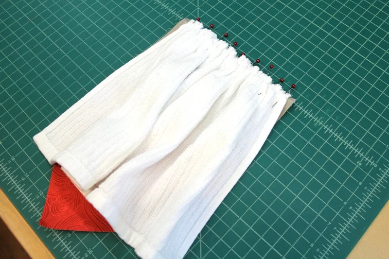 Towel pinned to Santa face