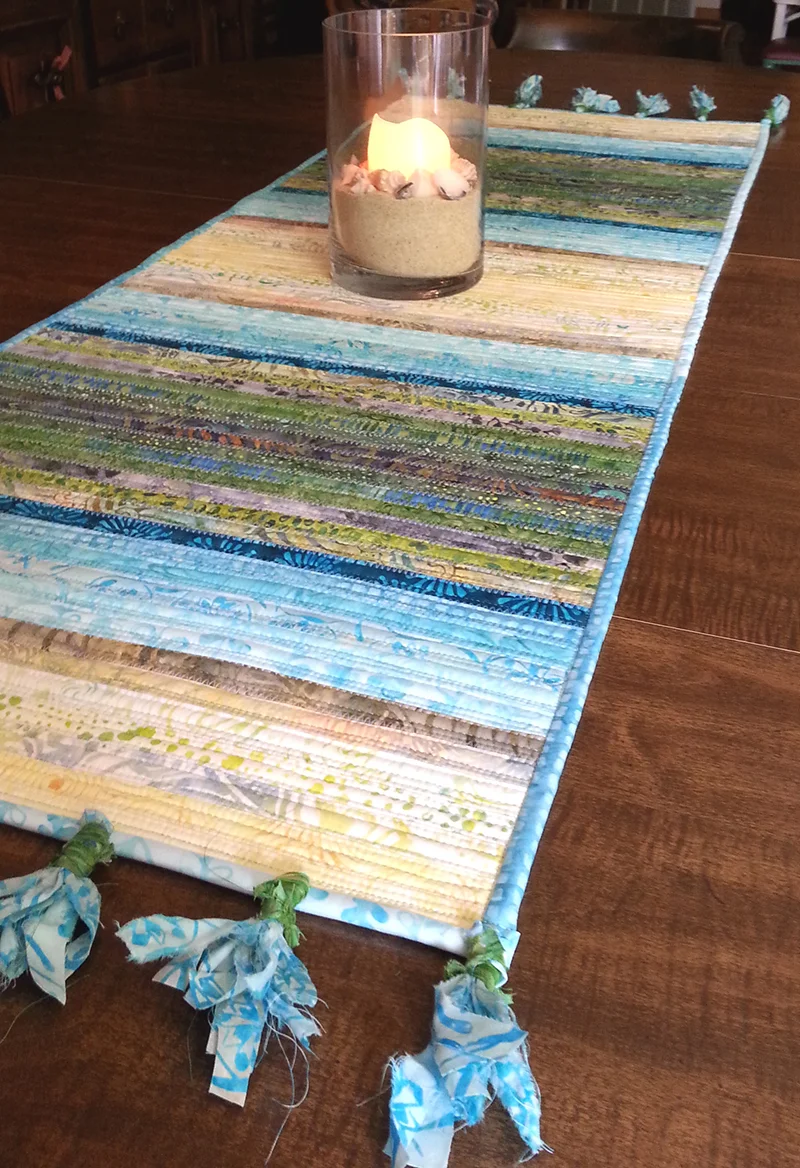 Tonga Cabana Tassel Table Runner from Timeless Treasures.jpg