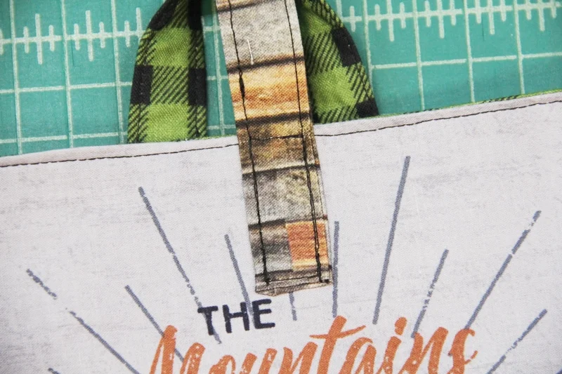 Second end of handle sewn in place