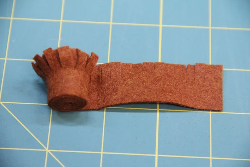 Continue gluing and rolling to end