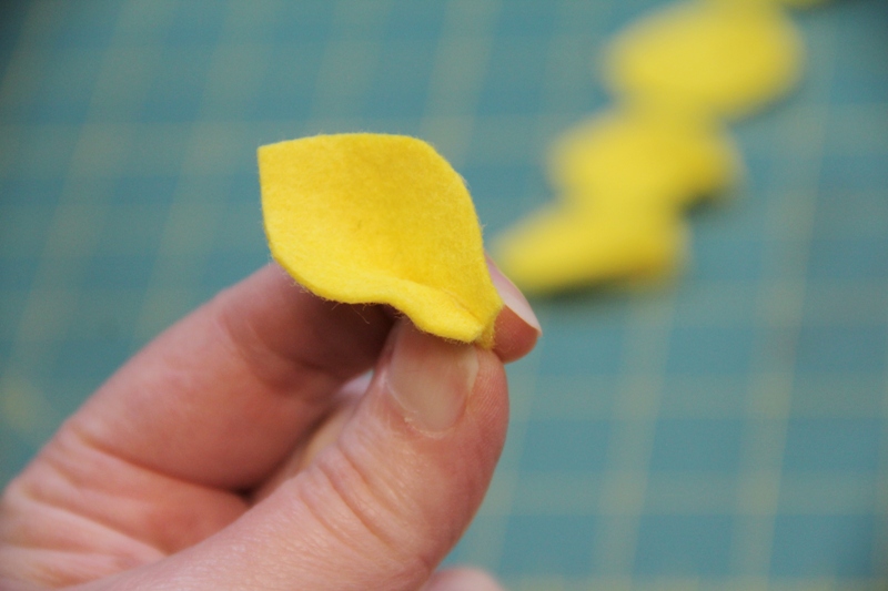 Pinch and glue bottom edge of petal