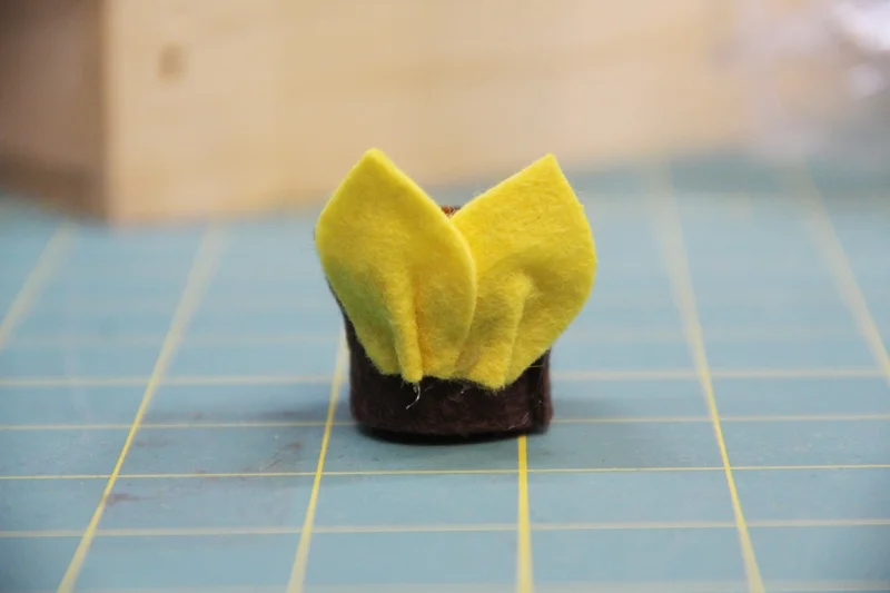 Overlap first petal slightly with second