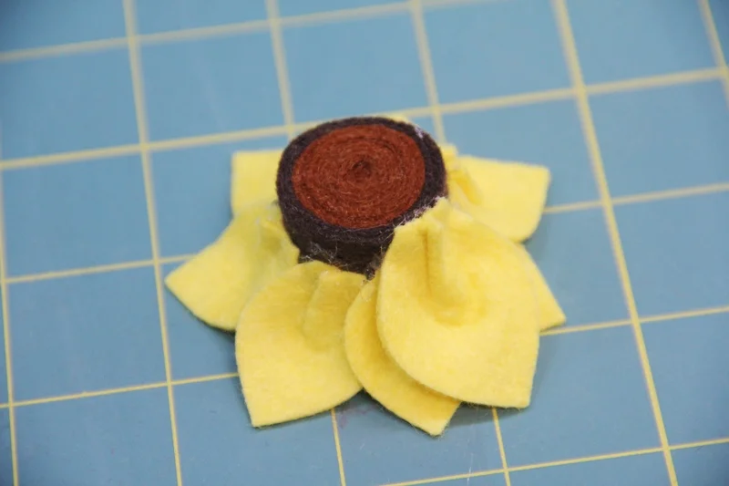 Start gluing second row of petals