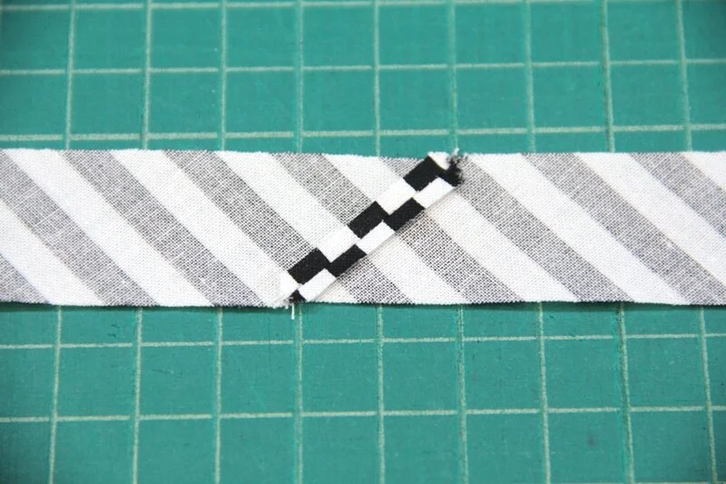 Seam pressed open on strip