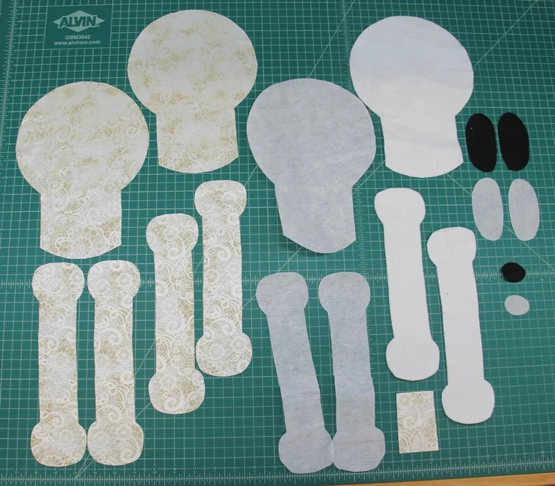 Pieces for skull and crossbones wall hanging