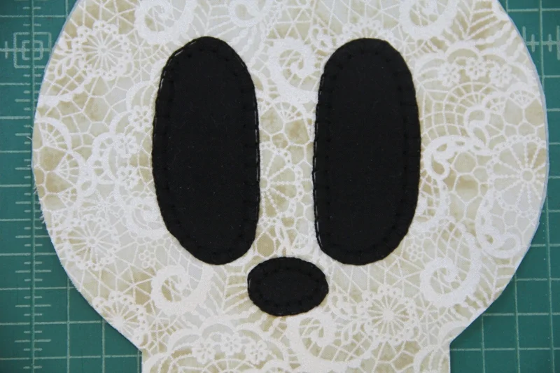 Eyes and nose stitched