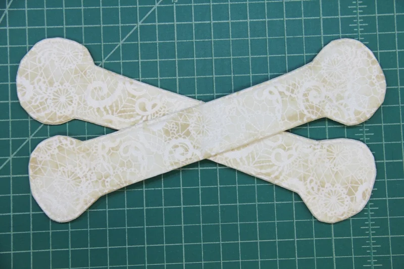 Bones stitched in cross shape