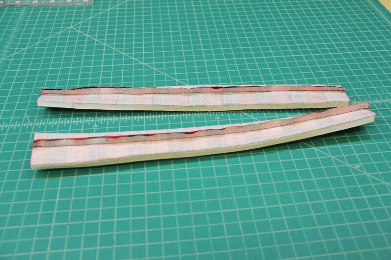 Stitch long edges of handles