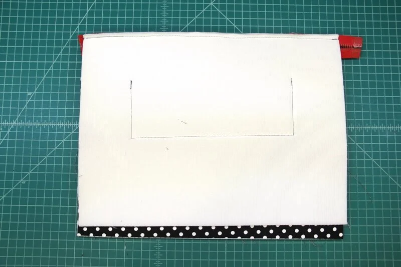 Stitch remaining side of zipper