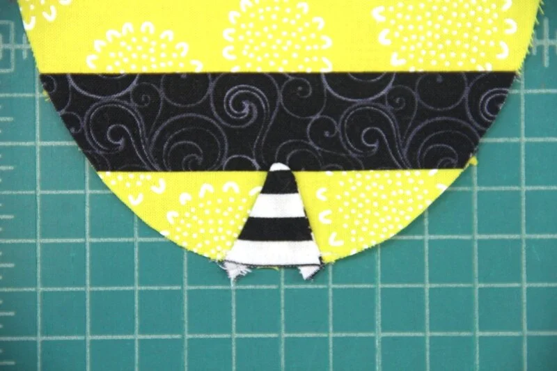 Stinger tacked to bee body