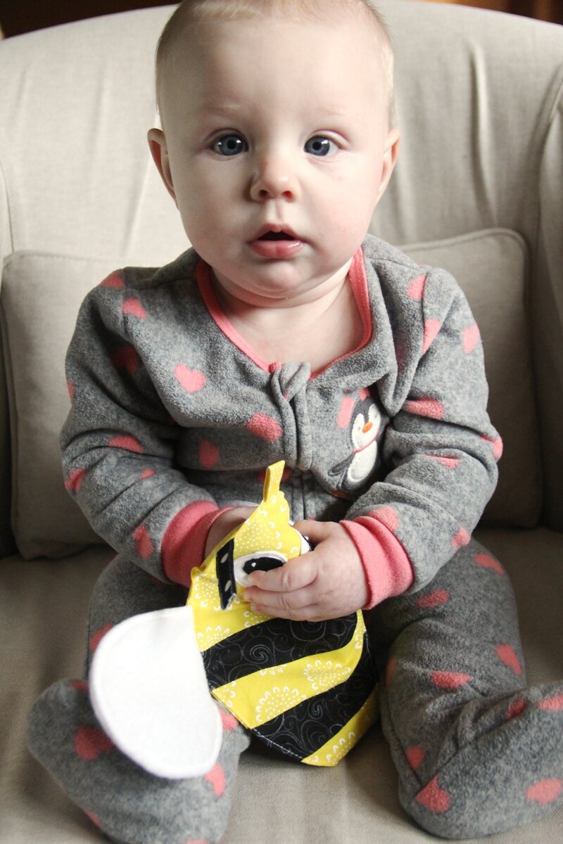 Charli and her Bee Crinkle Toy