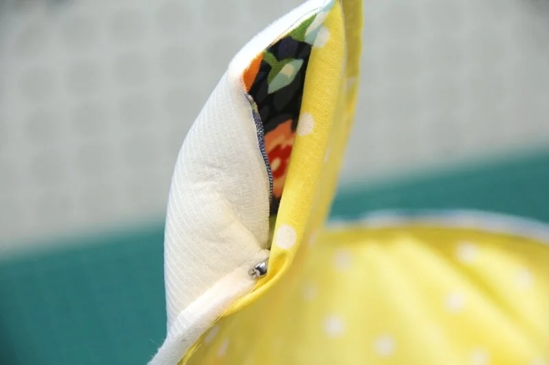 Pushing safety pin into handle end