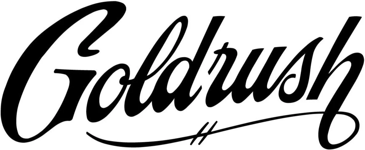 Stylized black cursive text that reads 'Goldrush' on a white background. The logo for a sign, graphics, and wrap shop in Kenner, Louisiana.