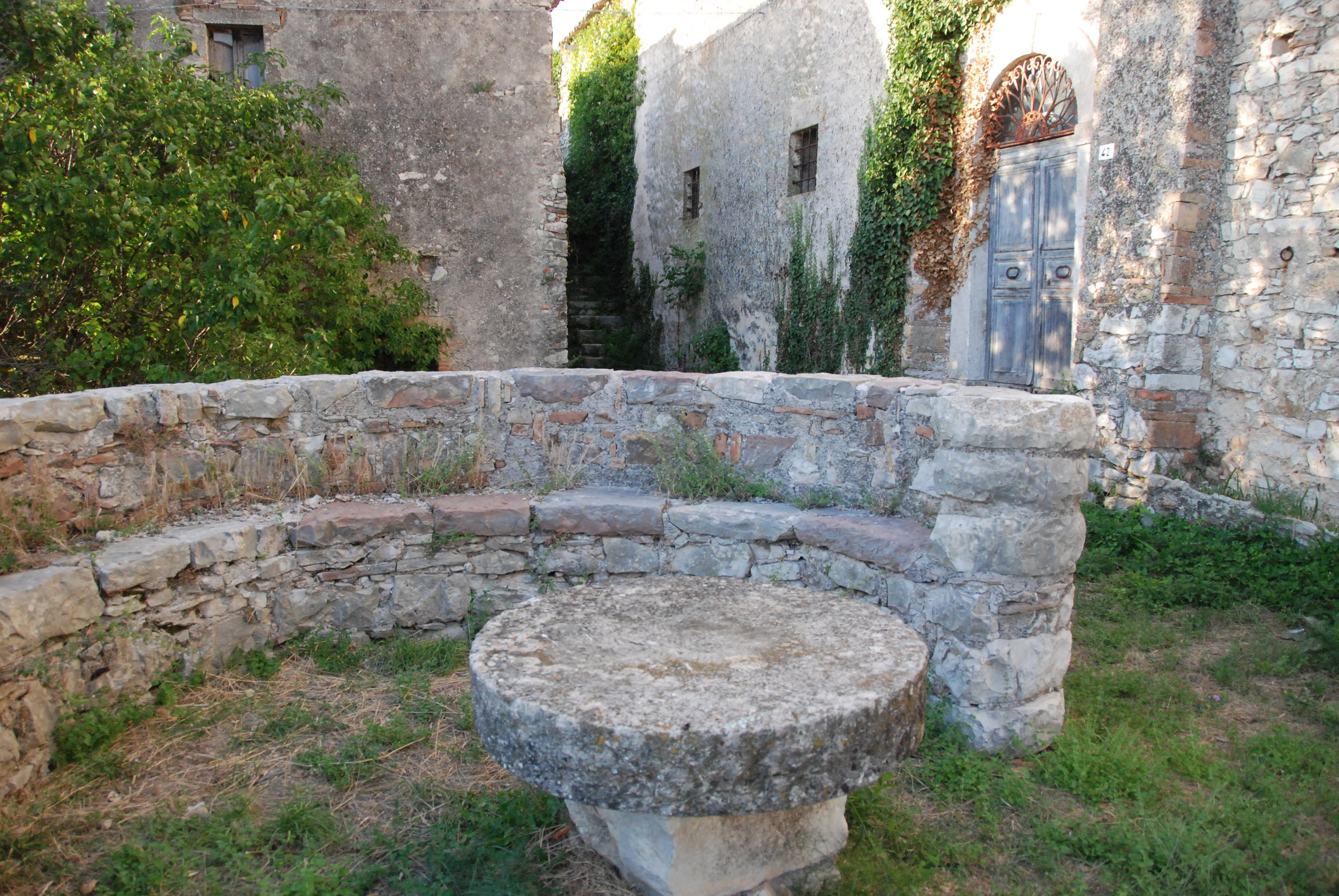 Medieval stone seat outside the Palace door.