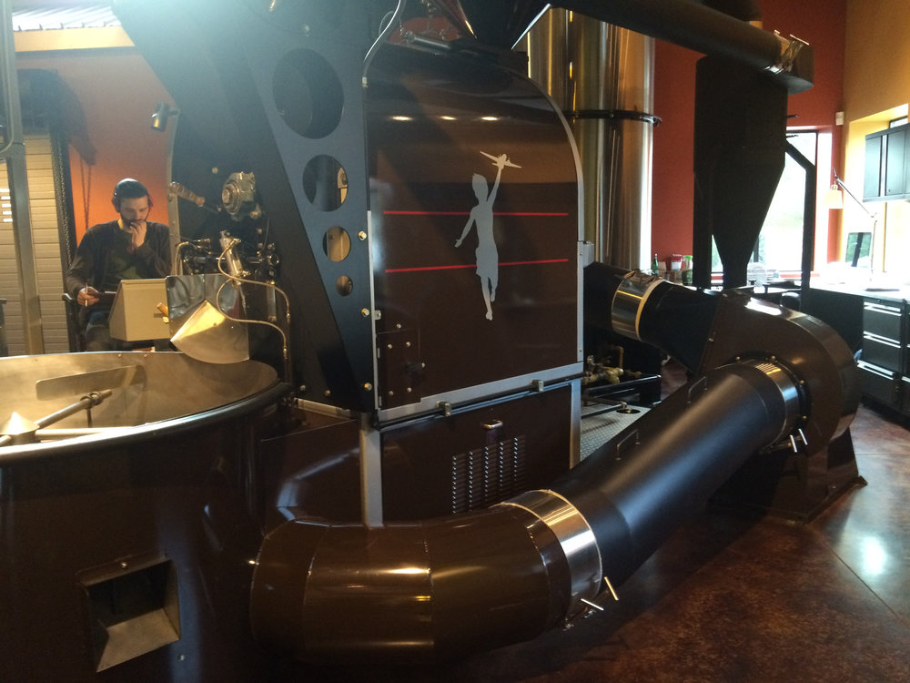  Storyville's big roasting machine. It looks just like something out of Willy Wonka to me. 