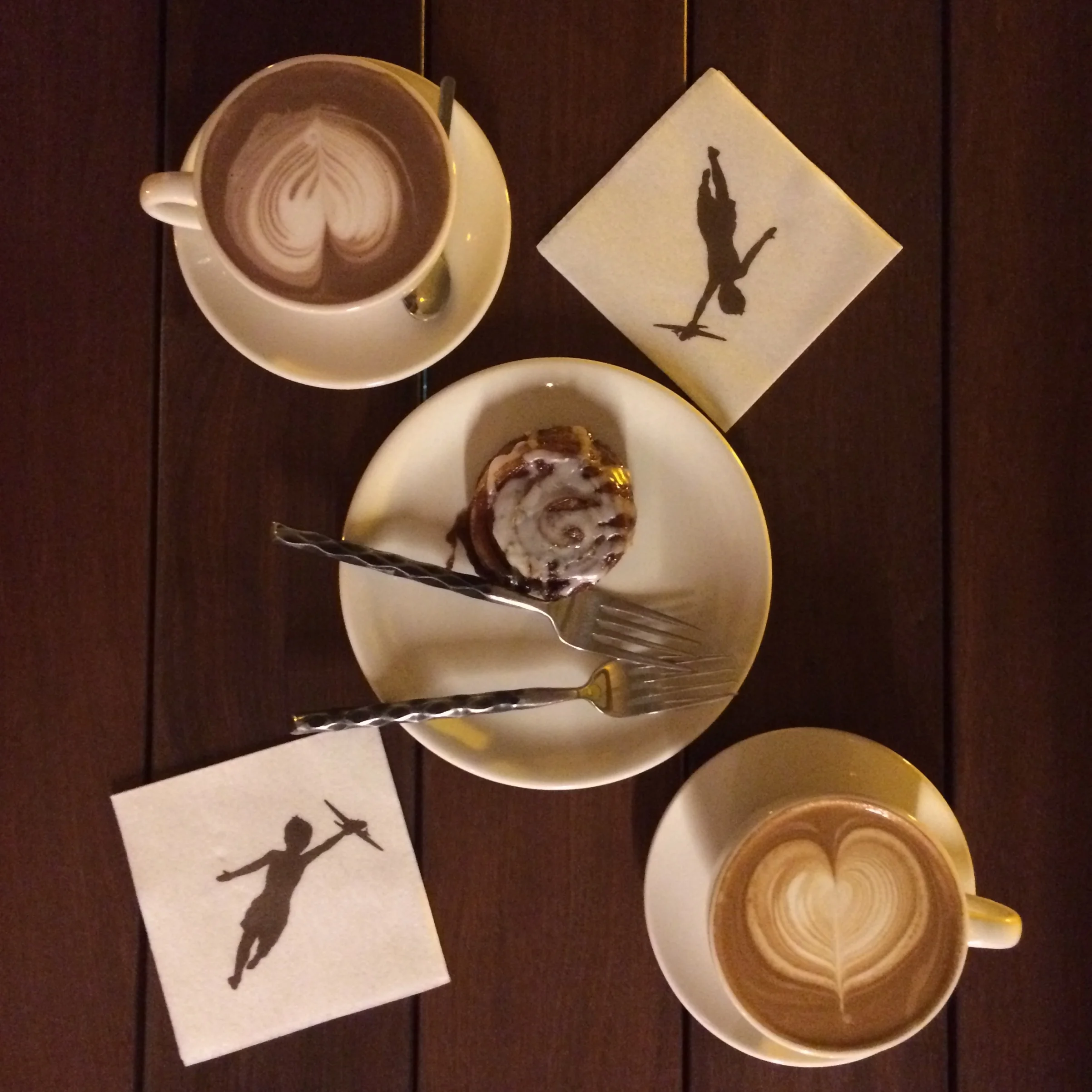 Coffe and hot chocolate for two with cinnamon roll at Storyville Coffee, Bainbridge Island