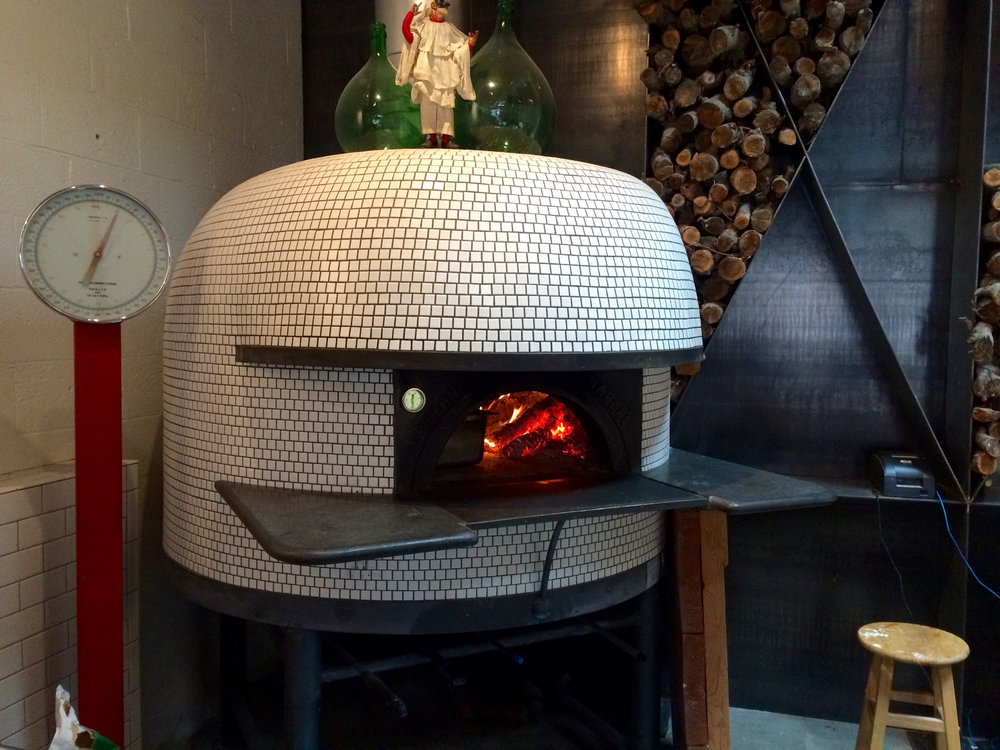  The Stefano Ferrara oven which was made in Naples, Italy, is such a beauty.&nbsp;I love the mosaic tile finish.    