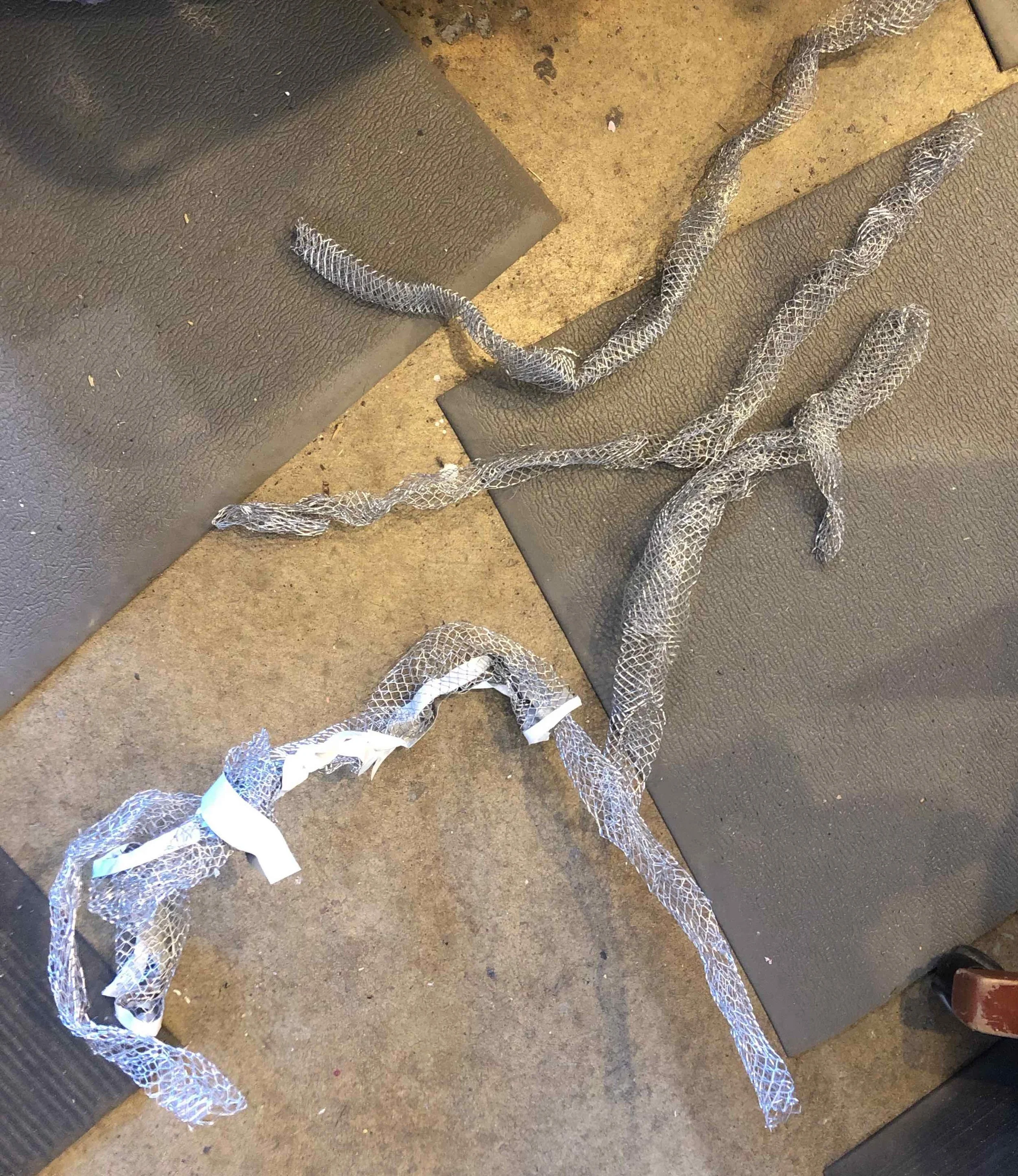 To give the coils some bulk and some sculpural good looks, we tried aluminum expandable gutter mesh. Fattening the coil with more abaca alone would be unwieldy and add several weeks to the dry time.