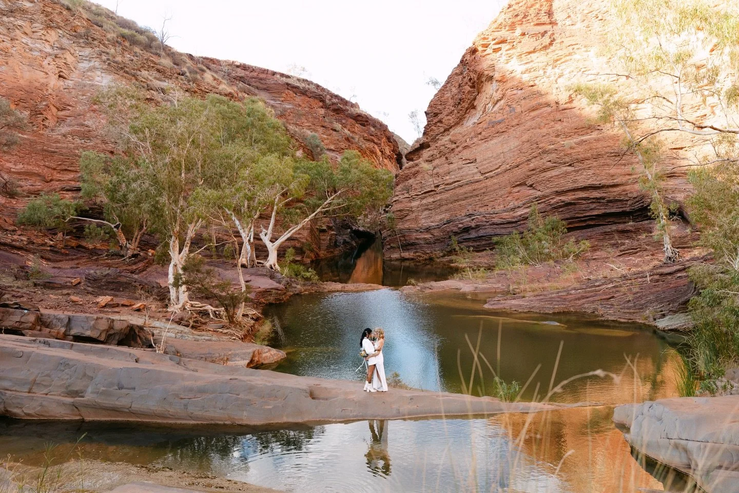 Sarah + Min&rsquo;s wild interstate elopement in Hamersley Gorge💘

What an honour to be flown to Paraburdoo WA!! I got to explore the gorgeous Karijini National park and see a part of this country I may never have seen. It was also such a pleasure t