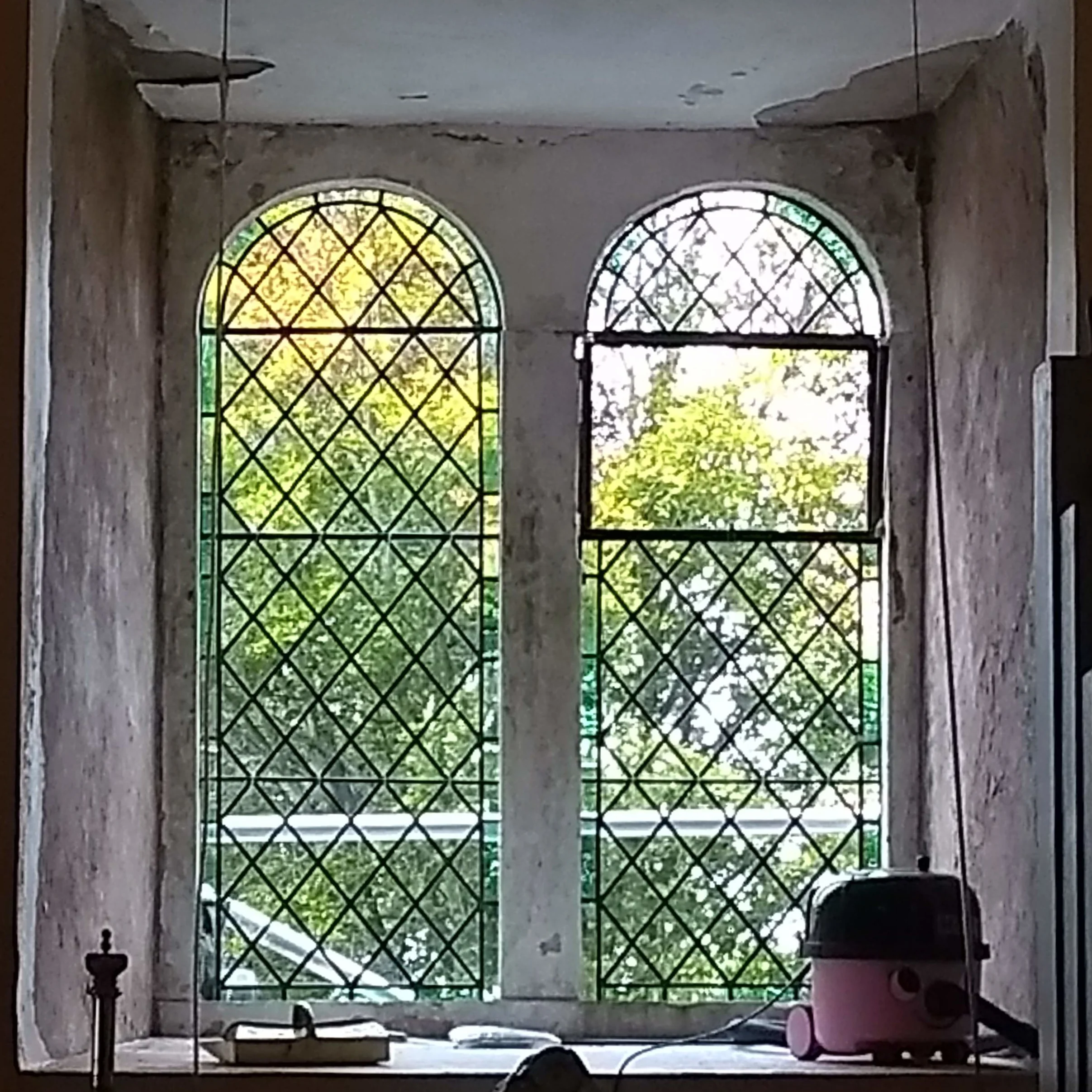 reinstallation: repointed in lime mortar with non-ferrous support bars