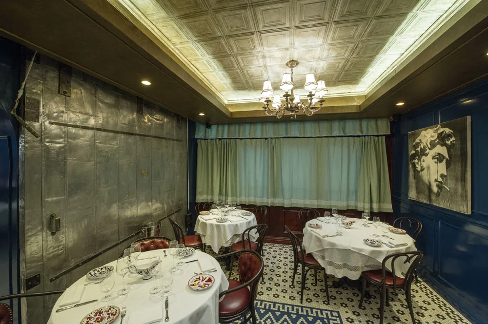 Dining room window and metal wall decor