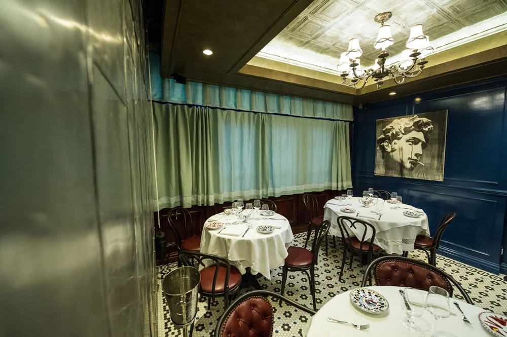 Dining room window and metal wall decor