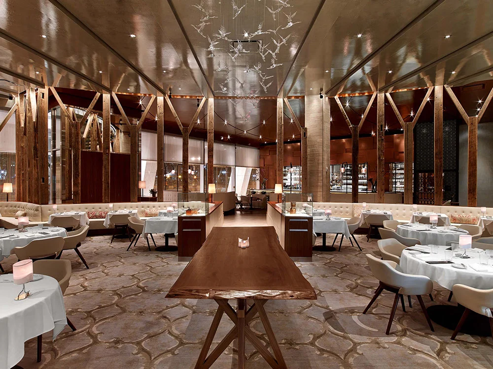 Reclaimed wooden timbers line the dining room