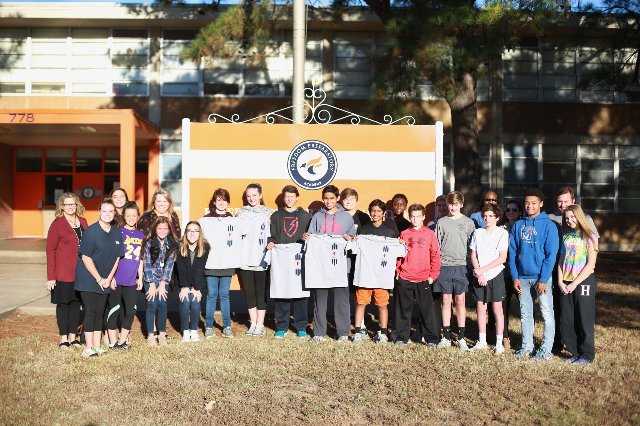 Houston Middle visits Freedom Prep to deliver school pride t-shirts and learn about the important work of Freedom Prep Academy.