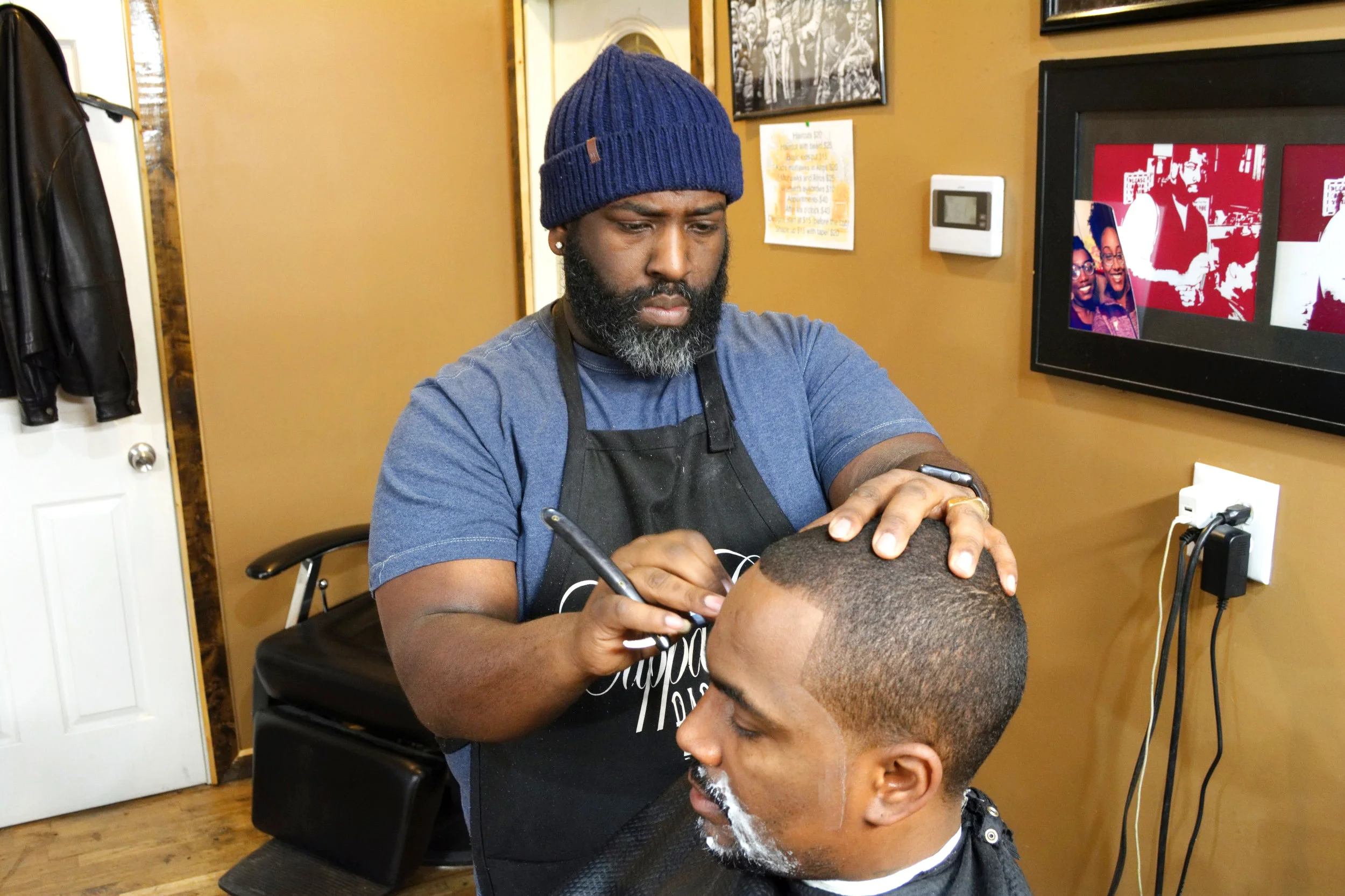 "My defining moment in wanting to become a barber is when I was taking my daughter’s mom to her house and we rode past a barber shop. It belonged to this well known barber named Big Don. He was working at the time and it was sold out. He had the nicest car in the parking lot. That steered me into thinking that I could make a living with this. So many people miss out on their gifts. I had a gift, dealing with these clippers about 23 years ago. Riding past Haskin's, right across Victory Park did it for me. I think that was the moment I knew that I needed to be in the barber shop. My first week in the shop, I knew I was going to make it. The second week was kinda rough. The first week, I came in at the right time. I started on a Thursday, it was busy. It was a bunch of walk-ins and the shop was on Broadway. That started it for me and let me know that I’m gonna be alright at this. What motivates me is watching younger barbers, that used to be customers, turning into the talked about barber. I’ve had the pleasure to witness that a couple of times. You know, guys that I’ve seen go to barber school and now they’re the household name. That motivates me. I remember walking in here and no one could see my vision. The barber that moved in here with me couldn’t see it either. He was like, ‘Man, we ain’t gonna make no money, right here!’. You can make money anywhere, it’s you. It’s not the location, it’s you. Now, location plays a part on the traffic but once you get a good barber, you don’t want to have to keep traveling around, trying to find somebody else. My service to the community has been positive. There’s been a lot of guys that have come to me for advice. I’ve even came in here needing advice. I’ve cut a lot of prominent people over the years. I ask questions. If I don’t know something, I’m asking questions and a lot of people have helped me. One of the most humbling experiences that I’ve had is when we moved over here. All I had was money to buy the building but not money to renovate the building. My customers all pitched in and helped me in some kind of way. That let me know what kind of impression I had on people. We’ve had guys that would come up in here and picking up sledge hammers to knock out walls because they want to see you back in business. That touched me so deep. Plus, there was 50% of the people in here who were helping and I had never cut their hair. That lets you know that this is more than a business. The happiest moment of life is when my kids came into the world. My happiest moment, pertaining the to barber shop, is when I got to cut Muhammad Ali. That was probably the stand out moment, an honor. But definitely, the happiest moment of my life, hands down, is that I have 4 children and being the first person to hold them. Ain’t no accomplishment greater than that. Don’t give up because failure comes first. The person that fails and gives up will be the failure. It’s gonna be bumps but the key is to get up. I’ll be the first to tell you that it’s been some nights when I didn’t think that it was going to work. Just keep your head and know that God has a plan for you. I think that’s the advice that I can give anybody. It’s going to be bumps but you can’t give up. As long as you got that ‘I won’t be denied’ type of attitude, you’ll be alright. Parents need to step up. Parents gotta start listening to the teacher before they pass judgement. They have to realize that their kid might be an angel but they’re not an angel all the time. I see so many parents that are ready to tear into a grown up over their kid. You think that you’re being a good parent, you’re not. You need to put your kid off to the side and let them see you talk to a teacher and someone of authority. If a kid sees you being disrespectful to another adult , what do you think he’s going to do? Ain’t no more respect. The reason why we have so many young dudes out here being disrespectful is because nobody showed them. No matter what you might think of a person, whether it be the police or someone working at McDonalds, when that respect is lost and you don’t show it, that little one behind you is watching you and doing the same thing. We’re all caught up in our lives and forget that we have these little guys watching and will end up acting just like you. Everybody needs to have an eye. When I was a kid, I cursed a lot. I grew up on Shawnee Terrace and my friends were all in that area. I would change the way I talked because I didn’t want to hear somebody’s parent tell me that I couldn’t come on their porch because they heard me cursing. Now, everybody is just minding their own business and don’t want no parts. You have a lot of people that are spectating and saying ‘I knew that was gonna happen’ and not preventing it before. We need to look out for one another and be nicer to each other. We need more of our own. I’ve been in stores and watched foreigners treat our kids like they’re stealing and will charge them extra if they’re not with an adult. We need to get our own and support our own. We don’t support each other at all. You’ll take some trifling shit from a big store. I seen it at Target or JC Penney and we'll take it. We won’t even take the time to call their corporate office but if it’s a small store, a black business, it’s the opposite. We won’t even mess with the store any more. That’s the mentality.” - Dontay, Owner of Clippa City, Russell
