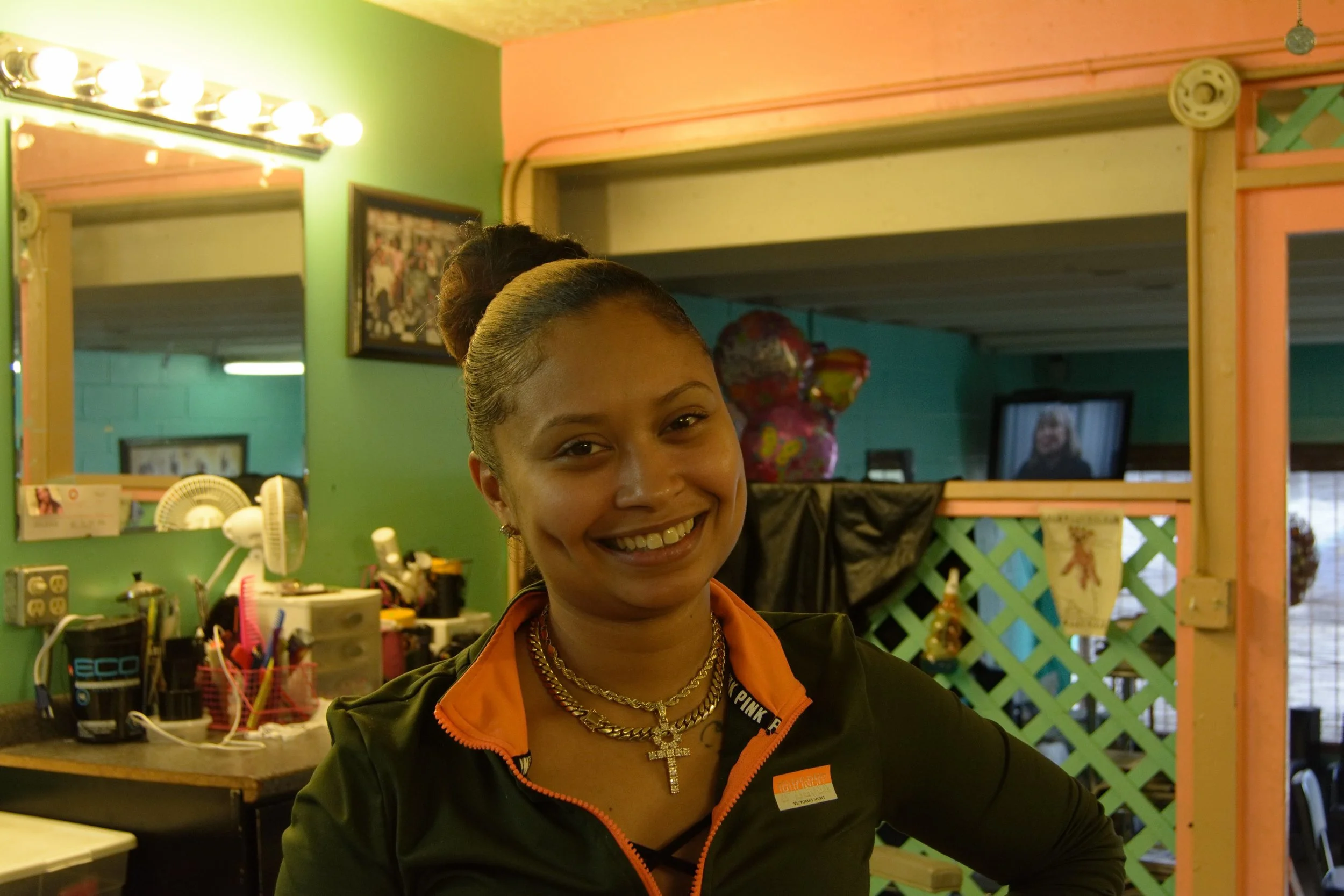 “I started braiding when I was eleven. My mama was a hair stylist, so I was a shop kid. She inspired me and I was brought up around all of this. Our whole family is full of hair stylists, so it was kind of inevitable. I’ve been in this shop for nine years. The money attracted me at first but it became more than that. Besides the money, it’s the feeling you get when you make other people feel good about themselves. That keeps me in it. Even when the money’s slow, you still have that feeling to fall back on. When you first get in the shop from hair school, it slows down a lot. You’re so used to being busy because hair school feeds you clientele. When you get out of school and out on your own, you have to start from the ground up and rebuild. It’s rough. After the transition, or so many years of staying at the same spot, it builds up. Starting out, it’s rough. Coming out of school, you’ll be going back and forth asking yourself if you want to keep doing this but you gotta keep going. You gotta put yourself out there. Social media plays a big part in me getting a lot of clientele. Put yourself out there and once you get out there, it’s all word of mouth. If you do right and you do good work, people will send people your way. My advice to people who are just starting out is to not give up. When it gets hard, just push a little harder. Everything will get better later on. Soon you won’t have to work as hard to get your clientele. Just don’t give up. Focus on you, yours, and what you’ve got going on. Don’t worry about nobody but your situation. When you worry about other people’s stuff, you’ll start losing track of yourself and try to keep up with everybody. Do your own thing and be good at it.” - Tiffany, Devastating Doos in Russell