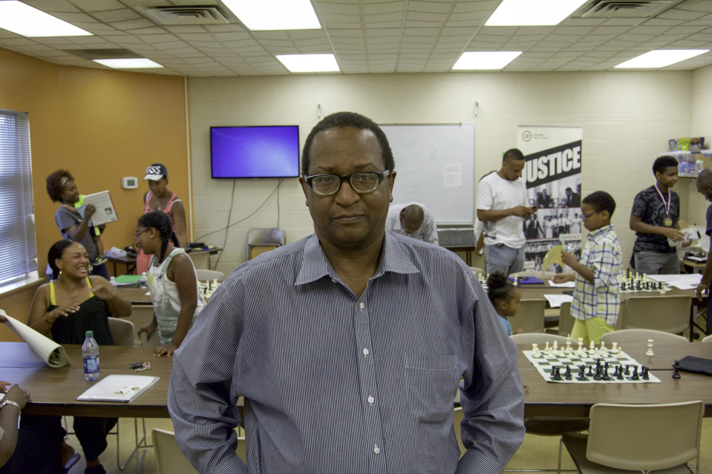 "Where did my interest in chess stem from? I’d say have to say my daughter, Sarah. She’s my first child and only child. I introduced her to chess when she was six. She started participating in tournaments at the age of seven. I wanted to introduce her to chess because there’s a lot of studies that show if a student gets involved and stays in chess, it’ll help improve their reading skills and math skills. That’s one thing that I really wanted for her. Reading wasn’t an issue, because she’s a bibliophile, like her dad and mom. I remember when she walked in the library in Boone County and looked at me and said, ‘Daddy, I’m in heaven.”. The math was an issue. We weren’t strong in math. My friend told me to get her in chess and it’ll help her with the math and it did. I saw what it did for Sarah and I wanted to introduce chess to other kids and that was it. In September 2010, I went into it, with the encouragement of Dr. Anthony Middleton, from Cable Baptist Church and I haven’t looked back since. Our vision is to become the most successful urban chess program in the Commonwealth of Kentucky. In order to accomplish that, we need the financial material resources. We have to get the students to tournaments, bring in other trainers, and keep solid training materials. Our biggest challenge, right now, is raising money to get to the nationals. Secondly, I would like like raise money to be able compensate our coaches for their time. Thirdly, it doesn’t hurt to have more clocks. We could use more clocks. We’re looking to be the best and we’re going to maintain program. When I’m dead and buried, I want this program to continue to be the best.” - Corbin, Director of the West Louisville Chess Club in Russell
