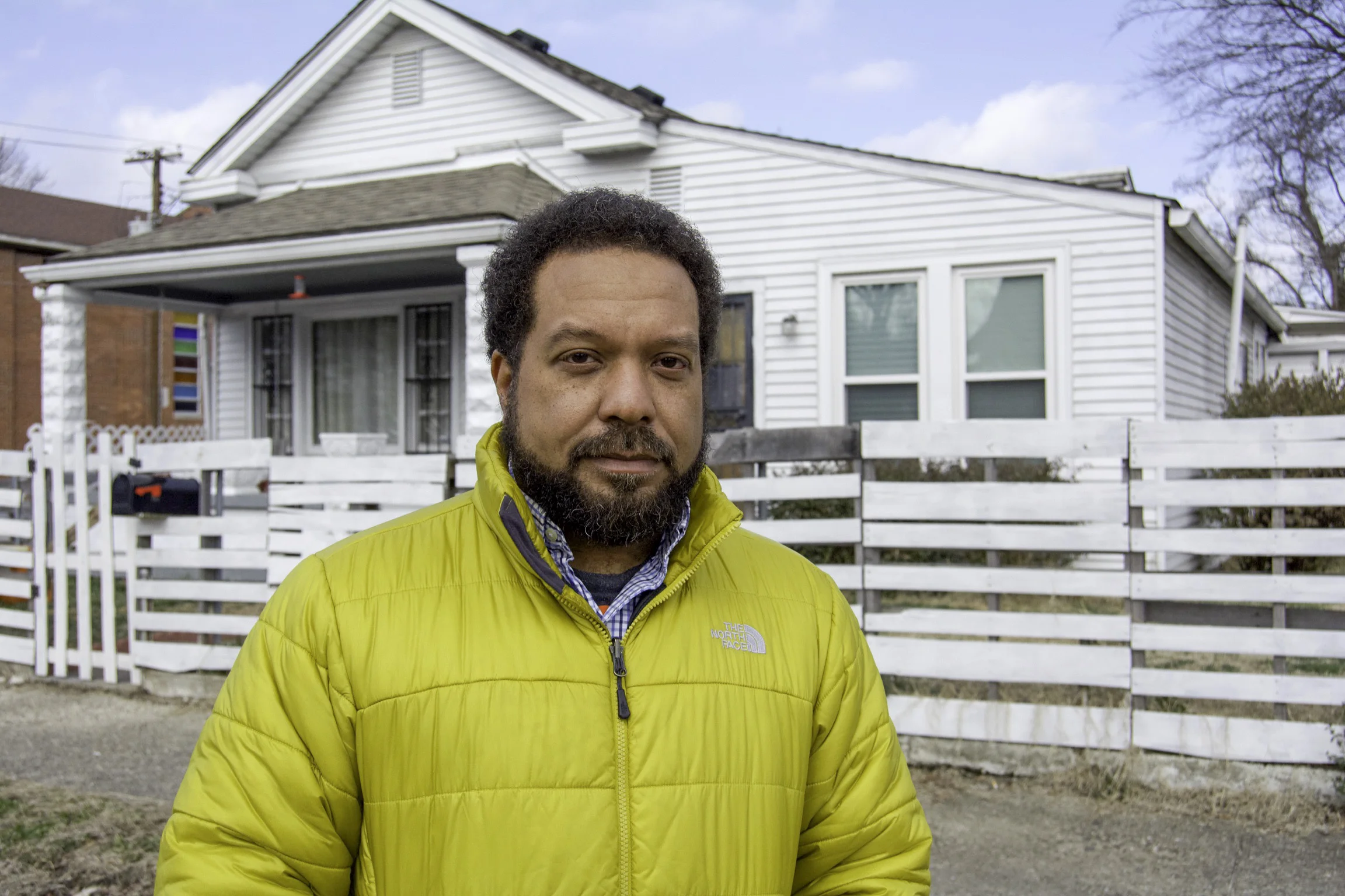 “I’ve been here for about fifteen years. I spent all of my childhood here, when I moved back from Delaware, with my dad. I stayed with my grandparents. We gotta house in J-Town but I went to school off Dixie Highway because that was close to where my dad worked. I used to catch the bus here from school. I spent all my summers here and everyday after school was spent here from 4th grade until I was a senior in high school. My best friend, at that time, used to live on Larkwood, by Shawnee Park. So, I used to either walk or catch the bus. We used to play basketball and I would walk or catch the bus right back. I remember going to Consolidated, which is now a halfway house, on the corner of 15th and Jefferson. It was like the department store. I remember getting my shoe laces getting caught on the escalator at Sears, which was on 9th and Broadway. My grandfather used to get carpet from this carpet place that used to be the Big A Shopping Center on Bolling. Me and my cousin, who is like my brother, these are the blocks that we ran. He grew up on 24th and Jefferson. This is where we were and this is what we did. We used to go to Dairy Del, Elliot Park to play ball and would run up all through here. I still keep in contact with a lot of people that I grew up in the neighborhood with. That’s changed quite a bit because it’s no where near as nice as it was when I was growing up. Even then, there was still a lot of older people here but you know, the houses and yards were maintained. It had that typical neighborhood vibe. For instance, if me and my cousin were doing something, at the end of the block, that we weren’t supposed to be doing, my grandfather would know about it by the time we got back. From the time we walked from one block to the next, my grandfather was like, “Come here!”. We already knew what was up, so we had to keep our noses clean because everybody knew Mr. Red. Everybody knew Mr. Red. I’m forty-five years old and my grandfather passed six or seven years ago and I’m still known as Mr. Red’s grandson. Just like guys, that are my dad’s age, they’re in their seventies and all of their kids and their kids used to get their hair cut by my grandfather. So, he’s cut about three, almost four generations of hair. It’s not too many places that I can go where somebody doesn’t know me as Mr. Red’s grandson. Of course with being a staple in Russell and living here for sixty-plus years. My granddad is my idol. He’s taught almost all of my life lessons like the importance of owning your own business. He taught me how to manage money. He always told us to pay ourselves first before we pay anybody else. Him and my grandmother used to always read the Bible close to us all the time. As a kid, I was like, “Man, squash that!”. Now, as an adult, it makes perfect sense. You know like, “A good name is better to be chosen than gold” is true and they constantly drilled that in us. We had to take piano lessons as we would read the Bible everyday. So everyday, after school, we would read a chapter from the Bible. My cousin and I would take turns reading chapter. I read the Bible, from cover to cover, about three or four times. When I first started reading it, I didn’t understand it because it was all of that old English. As I got further in middle and high school, I better understood. It’s just that discipline. It’s just that old school discipline. My grandfather was that old school disciplinary and we had our routine. If I was here, we know that every Tuesday we were going to the barber store and the candy store. HIs barber shop sold a lot of candy. That’s when we would go get candy and do all these other things. It wasn’t until later in life, when I was talking to my grandfather and some of this friends, that I would understand some of the things that he would do. Like, he used to always order his shoes from books. I always wondered about that. He would never really go to shoe stores and pick them out. He would order them from these little catalogs that he used to get. I thought it was because he stood for a long time and just needed special barbering shoes. Come to find out, when my dad was younger, at that time, department stores on 4th Street wouldn't let black folks try on shoes or clothes. That made my grandfather furious. He decided not to patronize those places and would order his stuff from catalogs. It was just those life lessons that are still with me today. You know, I went to church every Sunday. My grandfather was a deacon and in the choir. He was one of the toughest dudes I knew. This is always home. Plus, I like the bricks. I lived in J-town and had a nice apartment. I call this the bricks. I like the urban feel. I always loved the urban feel. I like having the ability just to walk up the street and walk to places. I like it. I like the density and the older homes. When I go to places like Chicago and Baltimore, I like that urban feeling. It’s not for everybody and I get that but it’s not so cookie cutter. Everything is different. I have a little apprehension about the new development. I’m positive but I’m apprehensive because I know how these things normally go down. I like to consider myself a closet historian and once you study Louisville’s history, especially Louisville’s race relations, you kind of see the same kind of patterns repeat themselves. You see the same kind of dog and pony shows and the dangling of the carrot. You know, like, if you do this, you may get this and nothing never happens. Or it does happen but it doesn’t happen to your or your community’s benefit. So, I stay guardedly optimistic but at the same time, you have to be engaged. One of the reasons that they are able to move the carrot and play Whack-a-Mole with you is because you’re not engaged. You’re not always there. Someone’s not watching and seeing what’s going on and calling people out and telling them what’s wrong and that they shouldn’t be doing certain things. The community needs a mechanism to get back to where we can have your locally black owned businesses. Just like you have all of those shops, clubs, and businesses on Bardstown Road, Russell was the same way. It was exactly the same way. You had Old Walnut Street, Broadway and Market Street. You had those corridors of high economic activity and that’s what we need to get back to. It’s not so much of bringing back the big boxes but we need to focus more on that aspect. The biggest thing is getting people who care about the neighborhood, to move back into the neighborhood and take that leap of faith. Now, a lot of people don’t want to because there’s not a lot in Russell. It’s like the chicken and the egg. Nobody wants to move back here because of the services but you can’t get the services without the people. Specifically, you can’t get the services without the income. What comes first? You have the Cedar Street development, that has the new homes. They’re trying to entice people to move back with those homes and that’s a good thing but you have a lot of these older homes. One good thing about these older homes is that the way that they are made, they are infinitely repairable. It just takes the elbow grease and the resources. I try to tell a lot of people that it doesn’t take that much money to do something like get the house and repair it. You can get some of these houses for $5,000-$10,000 and take out a mortgage for $150,000 and you’ll have just as nice of a home like one in Old Louisville and you’ll do more with it. You’ll have your granite countertops and your stainless steel appliances. You would have a home that if you could pick it up and move it NuLu, you would have a $600,000 crib. If we can get more folks to move back in and take ownership of some of these properties, you would see a big change. It’s going to be an uphill struggle because the economy in Russell no longer exists with black folks in Louisville and that’s the biggest issue. We had a lot of newly free blacks leaving the South and other parts of the Kentucky to come to Louisville because we had those jobs, like Philip Morris, Brown-Forman and tobacco warehouses. There were plenty of places for people to work. Then you had the L&N railroads. They had pullman porters back in the 20’s, 30’s and 50’s. Being a pullman porter was a big job and L&N was right there. You could walk to Union Station and go to work and come on back. There was a lot of that type of money being generated, which made it easier for guys like your A.D. Porter, Stiths and those guys to start businesses and have candy stores and things of that nature, to kind of generate that economic mercantile class that you need. It was that solid black middle class that you need to keep things going. Once Louisville’s manufacturing base started to leave. International Harvester closed and all the tobacco companies started to move away. L&N went under. Louisville changed from a manufacturer to more of a service economy. It took a lot of that wealth with it. Then you had urban renewal come in and it destroyed the last remaining of the strong black business districts. It was a one-two punch that was hard to recover from. It’s hard to get that back but you have to figure out a way to get that back and that is Louisville’s struggle. You know Louisville has a grant, right now, and they’re using that for Beecher Terrace. Louisville also has a Place of Promise grant, which seeks to revitalize Russell, without gentrification, and focuses on homeownership and getting jobs. The trick to it is that there is a lot of jobs in Russell but they don’t hire people from Russell. The jobs in Russell actually pay above the national and Kentucky average, as far as wages. They just don’t hire anybody from West Louisville and that’s a very big problem. Half the businesses here aren’t hiring anybody here. You’re still dealing with the racial inequalities and things of that nature.” - Haven, Russell 