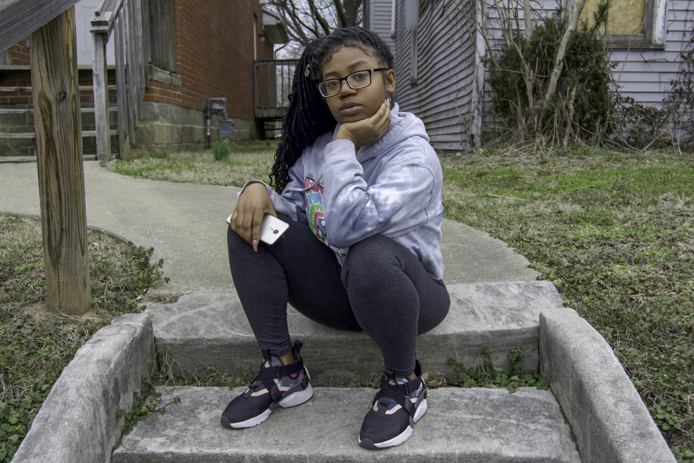 “It’s very family oriented and you see a lot of love shown down here. What makes it home to me? I can walk down the street and know somebody. I can walk around the corner and somebody would be ready to help me with anything. It’s lots of help and love but at the same time, there’s a lot of lost souls. We need more love for the youth because we’re the future. We need more people to set examples and give us guidance. You see liquor stores on every corner. Where are the bookstores? I wanna see stuff that’ll help us and allow us to come together. I would like to see a difference. I wanna see unity, love, support, and happiness. I’m tired of seeing gun violence and drugs. We need more black-owned businesses and fewer liquor stores! The kids need a place to go to after school and adults need places where they can just hang out. We just don’t have anything like that. My biggest influence is my mother. As a single parent of three, she did an awesome job with us. She instilled wisdom and knowledge by showing me that you always need to know where you’re going and where you come from. She taught me that I can’t stay in one place too long - I have to keep going. My mother keeps me going. We just went to go look at colleges and I’m feeling good about that. I was lost at first but after visiting colleges, I’m feeling really good about myself. I know what I want to do. I plan on going to Sullivan. They have a lot of stuff for me. I want to own my own business, so I’m going to be taking up marketing and business management. I want to own a hair salon. I feel that Sullivan will help me with my career. They are directing people to make their own paths. I learned about the guy that owns Super Chefs. He went to Sullivan and graduated from there. I learned that he didn’t have any money and was homeless. I found that it was amazing that he took a chance on himself and created a successful business. That’s role model goals! I sometimes battle depression but there are people around me who help and show me that there are better ways to go about things and that I don’t always have to be down. I put God first, too. Like, when I’m not in the best of moods, I got my mom and family that help me. Even when I’m in the West End and I’m walking down the street, there’s always somebody saying, “Smile, young lady!” At the end of the day, life is something to be happy about. Every day that you wake up is a blessing. There’s a purpose for everyone’s life. In order to fulfill your purpose, you have to live.” - Shania, Russell