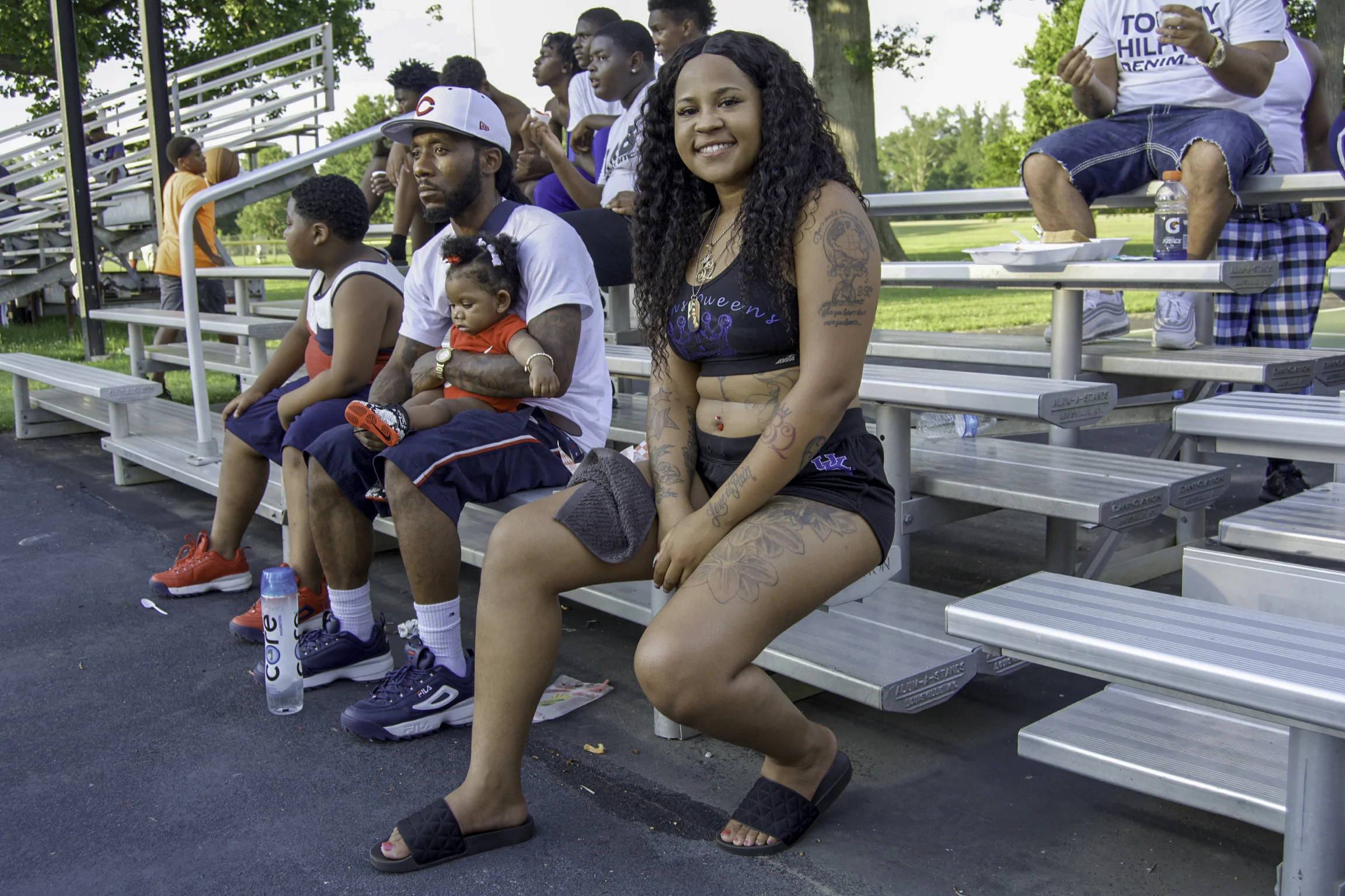 “I’ve been coming to the Dirt Bowl for about six or seven years, now. It’s like when you turn off Broadway, into the park, it’s always great vibes and great feelings. When you get in here, you see everyone having a good time and just out here living. There’s food and kids everywhere. The police and vendors are here, too. It’s just a good time and it’s exciting to see everybody together and getting along. My father is actually one of the Dirt Bowl legends - his name is Gerald Gray. I came down here to see the East End play. I have friends that I graduated from high school with that are playing now. So, the Dirt Bowl is literally everywhere, it’s all around me. If you wanna have a good time, watch some basketball and listen to some good music and have a good time, come to the Dirt Bowl. Your stomach will hurt after all of the laughing, too.” - Lamonique, 2019 Dirt Bowl at Shawnee Park