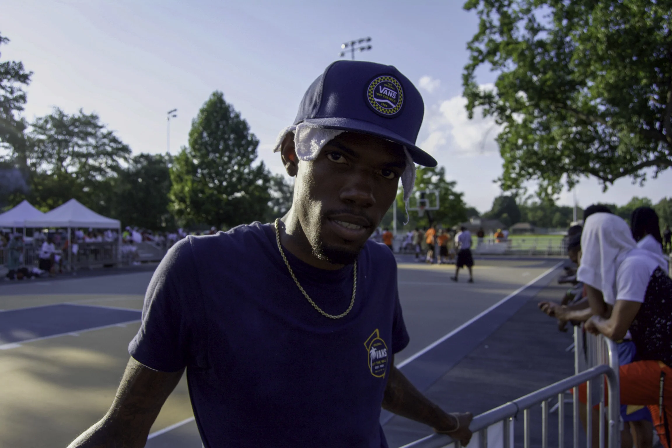 “My first experience with the Dirt Bowl was with “Get Buckets”, like five or six years ago. Then I went to “Stamped Up”, then I went to “4100” for a couple of years. I went to “Redemption” and now, I’m at “Park Hill”. I’m from Park Hill. I could’ve played with “Redemption” this year but Park Hill’s my heart and soul. That’s where I grew up and I can’t tell them no. The Dirt Bowl keeps me out the way. I look forward to playing my games. I look forward to Cornell and Ravon talk shit. It’s actually a good outlet to let out stress. I don’t do drugs or anything like that, I love to play basketball. I love seeing my friends, that I grew up with, out here. It’s more than gun violence and stuff out here. This is a beautiful thing. The police have been on it and people feel safe. They’re even walking people to their car if they need it. I just hope that they keep it going and it won’t be any foolishness. I’m kinda mad that I wasn’t born fifty years ago, when it first started. I know it was dope. I’m a sucka for finding out what was before me and I respect what was before me. Like, I see the highlights from back in the day and I’m wishing that I was in that era. I got an old soul. I’m sure the competition is weaker now than it was back then. I’d love to continue the legacy. When my son gets older, I want him to play in the Dirt Bowl. Even if he gets offers from division one schools, I still want him to experience the Dirt Bowl. You can have so many local supporters and you gotta get your city behind you before everybody else. This is a nice way to get your city behind you and get your name out there. It’s not just for the hood but the whole city. Wherever I go, everybody knows Polo and I support everybody. I’m a fan of basketball and these are my friends. We hoop every day together.” - Polo, Shawnee