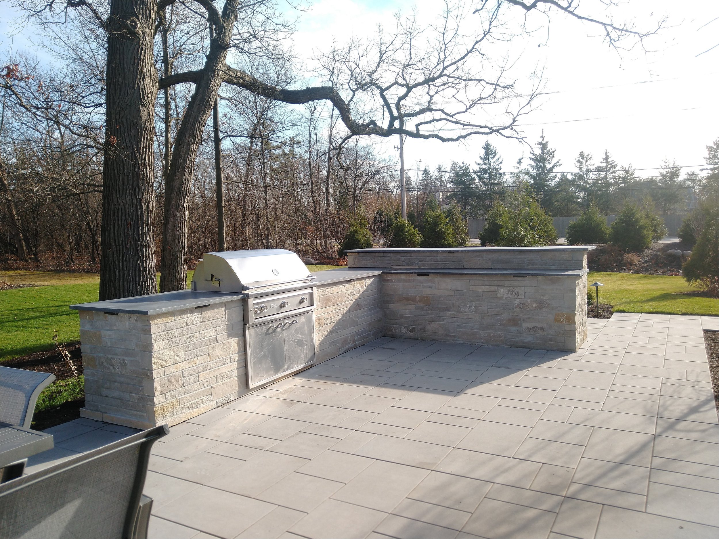 outdoor kitchen countertop stone island.jpg