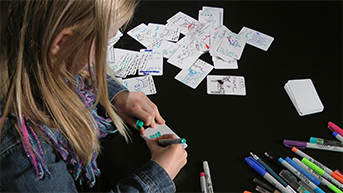 Lillian working on original card illustrations
