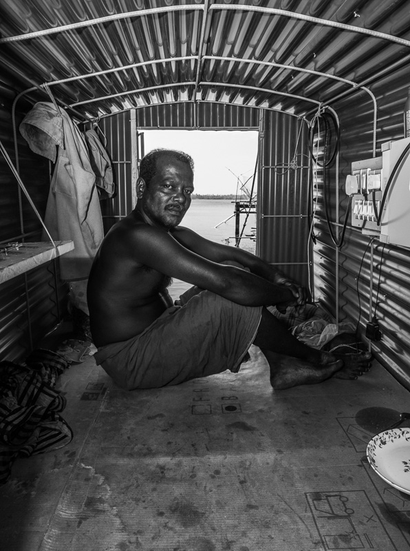 Fisherman in Shed, Cochin